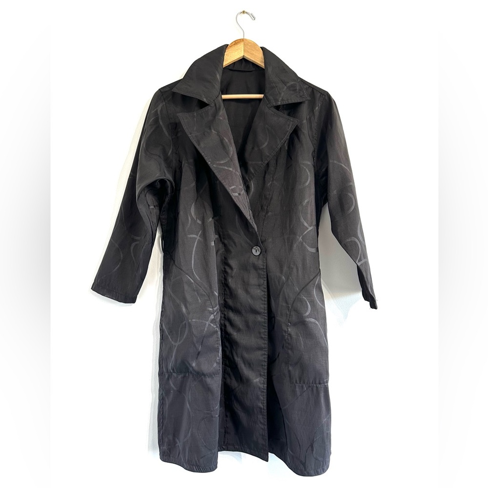 Mycra Pac Now lightweight long trench coat jacket black graffiti pattern